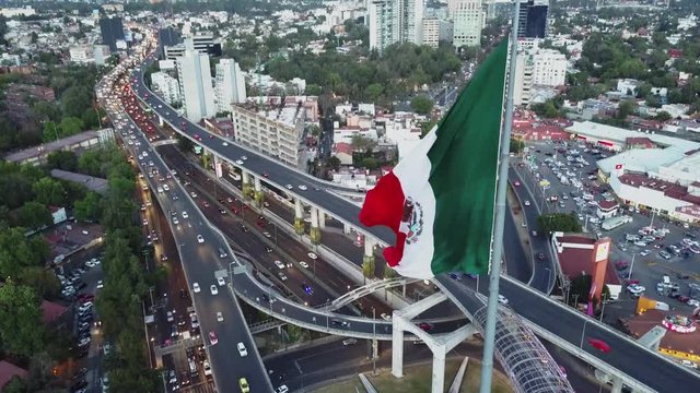 monumental mexican flag waving in mexico city shot by a drone bandera monumental de mexico ondeando en la ciudad de mexico grabada por dron