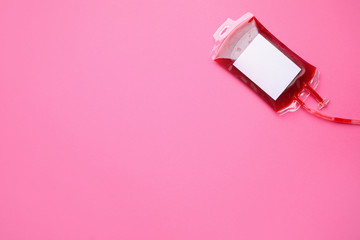 Blood pack for transfusion on color background