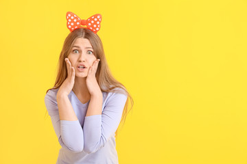 Woman in funny disguise on color background. April fools' day celebration