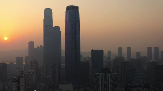 sunset time flight over changsha city downtown famous towers riverside aerial panorama 4k china