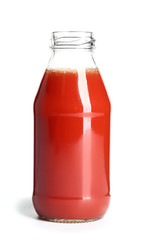 Bottle of fresh vegetable juice on white background