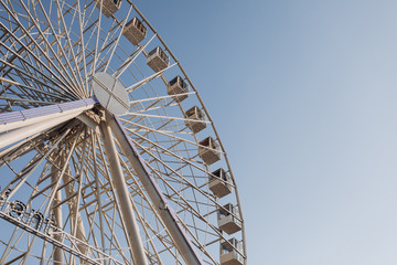 ferris wheel on the background of clear sky