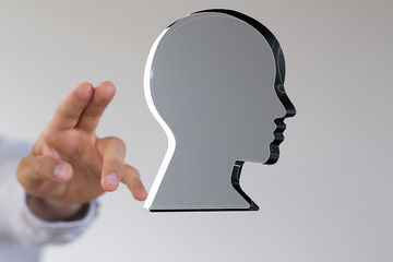 head with symbol neurons in brain.