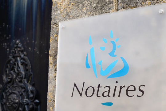 notary board blue sign logo entrance building office for french Notaire