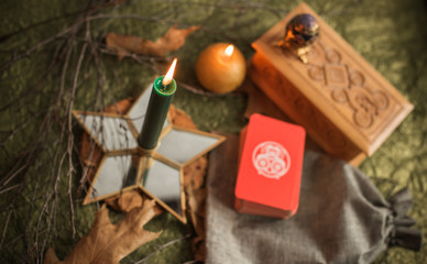Magic scene, Mystical atmosphere, candles on the table, esoteric concept, fortune telling and predictions at home 