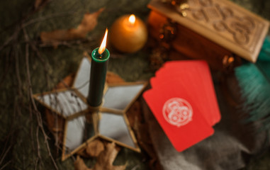 Magic scene, Mystical atmosphere, candles on the table, esoteric concept, fortune telling and predictions at home 