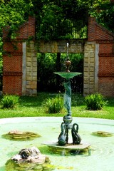 green statue in the fountain © LuisGregorio