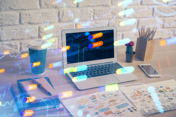 Double exposure of desktop computer and technology theme hologram. Concept of software development.