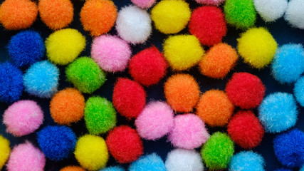 Fototapeta na wymiar Colorful balls and colorful of background. Background of colored soft balls. Accessories for needlework and children's creativity