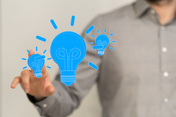 idea lamp concept in hand.