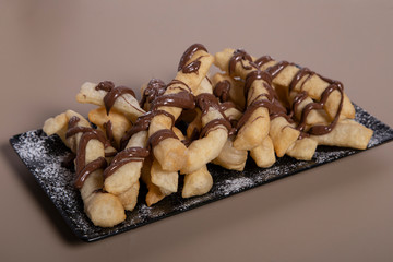 Typical Neapolitan dessert with nutella and powdered sugar.