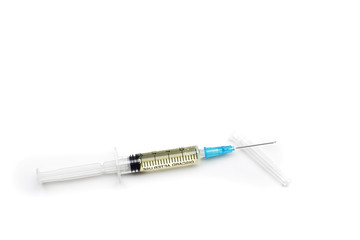 Fototapeta premium close-up of a syringe with an injection and a cap on an isolated white background.