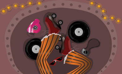 Overhead shot of clown style pants with rollers on the feet and sunglasses, camera, pink phone, vinyls