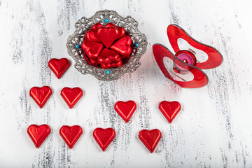 Valentine's Day heart- shaped chocolate candies. love concept for valentines day with sweet and...