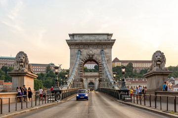 BUDAPEST, HUNGARY, JULY 12, 2015: Wide angle shot of Chain Bridge, a chain bridge that spans the River Danube between Buda and Pest, the western and eastern sides of Budapest, the capital of Hungary.