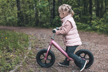 little girl on a bike