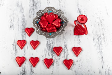 Valentine's Day heart- shaped chocolate candies. love concept for valentines day with sweet and...
