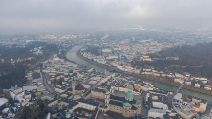 Fototapeta na wymiar Aerial view of Salzburg old town and Hohensalzburg Fortress. View on City and river from above 