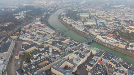Aerial view of Salzburg old town and Hohensalzburg Fortress. View on City and river from above 