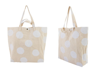 White canvas bag with random white dots pattern isolated on white background.