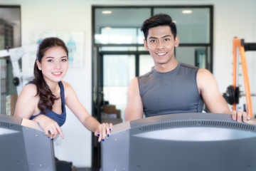Fototapeta na wymiar Young couple workout in gym,Valentine's day