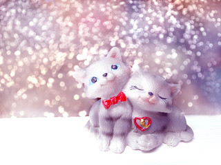 valentine's day card with cats couple toys on bokeh background