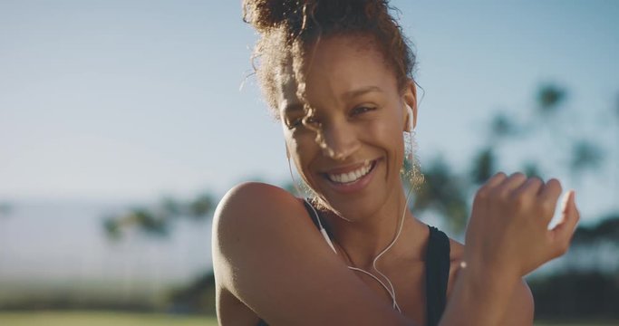 Portrait of a happy smiling african american woman getting ready for her morning workout, athletic african american woman living a healthy lifestyle