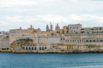 Fototapeta na wymiar Fort Saint Elmo, star fort in Valletta, Malta stands on the seaward shore of the Sciberras Peninsula
