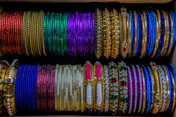 Picture of colorful bangles for weeding purpose kept in a bangle box