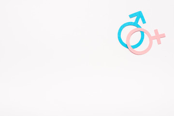 blue and pink gender symbols isolated on white, sexual equality concept