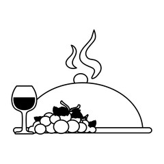 wine glass with grapes and tray server on white background