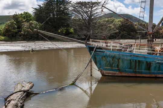 Owaka Catlins New Zealand. Abandoned boat. Ship at Catlins river