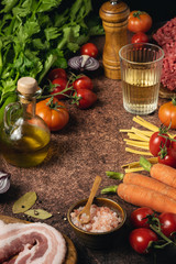 Italian cuisine background on dark rustic background, top view