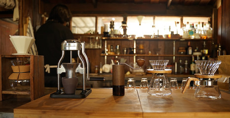 Coffee equipments in the coffee shop on timber counter