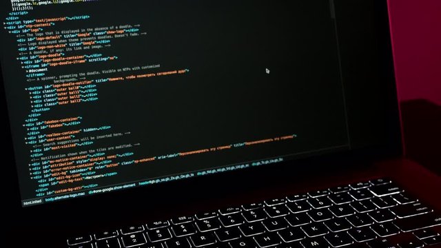 Scrolling html code on the laptop screen.