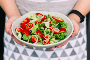 Vegetarian salad with tomatoes, cucumber and sweet pepper