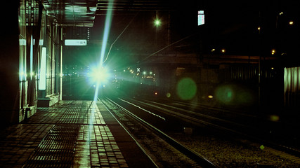 light train at night on the peron