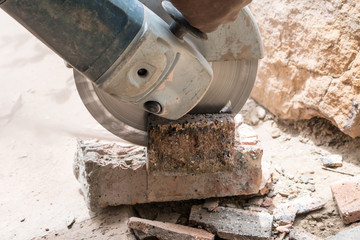 Angle grinder used to cut bricks