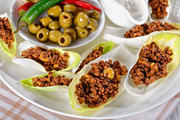close-up of Endive Boats on a white plate