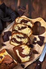 Delicious homemade marble pound cake  on wooden background, top view