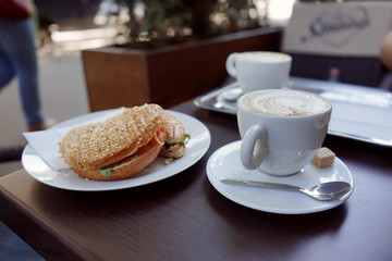 Bagel with smoked salmon and cup of coffee
