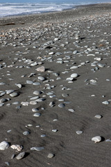 Fototapeta na wymiar Okarita South island coast. New Zealand. Stones at beack. pebbles