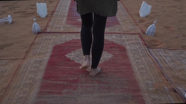 woman walking in nomad camp