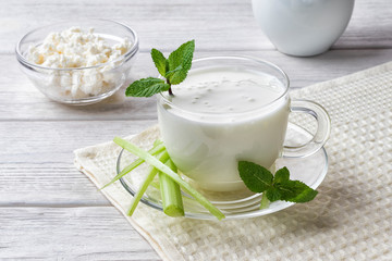 Obraz na płótnie Canvas Airan or kefir drink, fermented milk drink, fermented probiotics on a white background