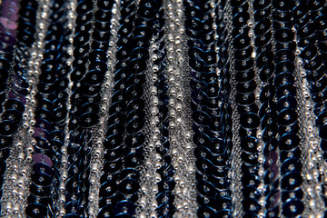 Vertical pattern with blue sequins