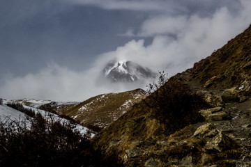 Kazbeg mountain in winter in Northern Georgia - 321040895