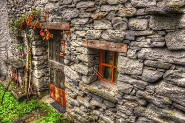 Fototapeta na wymiar Rustic House in Stone in Ticino, Switzerland.