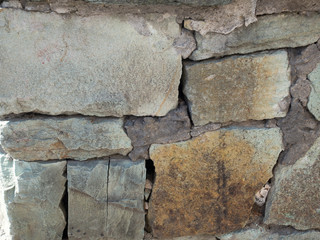 hand made irregularly built rock wall