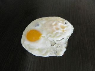 scrambled eggs isolated on wooden background