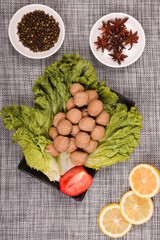 The fresh beef balls are put together with some seasoning. It is used as a ingredient of hot pot